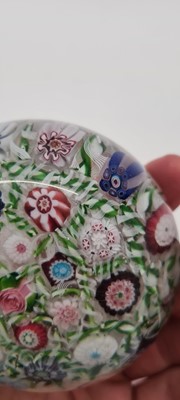 Lot 202 - A Clichy glass spaced millefiori paperweight
