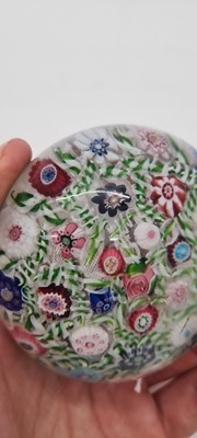Lot 202 - A Clichy glass spaced millefiori paperweight