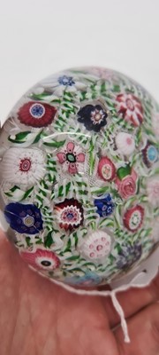 Lot 202 - A Clichy glass spaced millefiori paperweight