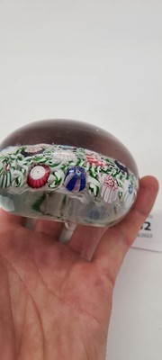 Lot 202 - A Clichy glass spaced millefiori paperweight