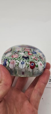 Lot 202 - A Clichy glass spaced millefiori paperweight