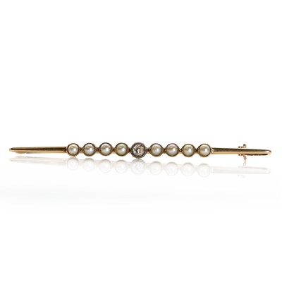 Lot 1034 - A seed pearl and diamond bar brooch