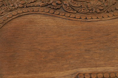 Lot 80 - A near pair of teak camel occasional tables