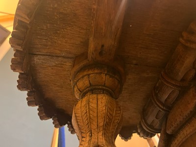 Lot 80 - A near pair of teak camel occasional tables