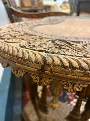 Lot 80 - A near pair of teak camel occasional tables