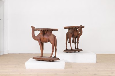 Lot 80 - A near pair of teak camel occasional tables