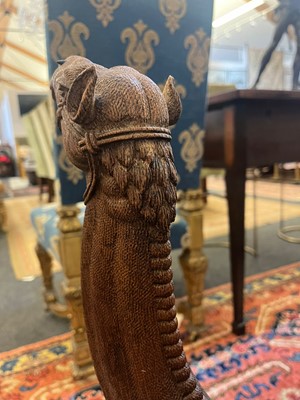 Lot 80 - A near pair of teak camel occasional tables