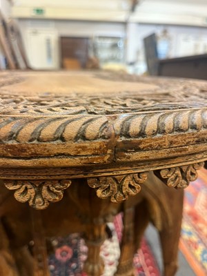 Lot 80 - A near pair of teak camel occasional tables