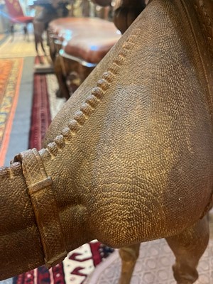 Lot 80 - A near pair of teak camel occasional tables