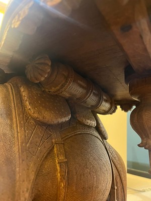 Lot 80 - A near pair of teak camel occasional tables