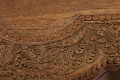 Lot 80 - A near pair of teak camel occasional tables