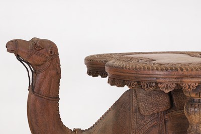 Lot 80 - A near pair of teak camel occasional tables