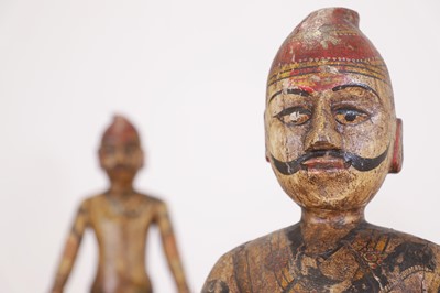 Lot 314 - A near pair of carved and painted figures