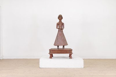 Lot 312 - A carved and painted wooden figure
