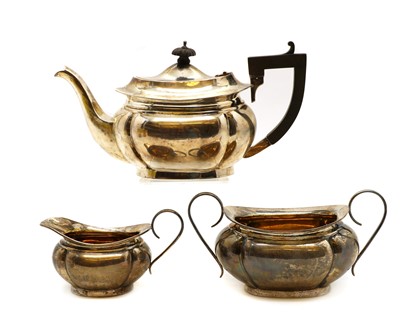 Lot 16 - A silver three piece tea service
