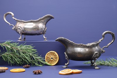 Lot 330 - A pair of George III silver sauce boats