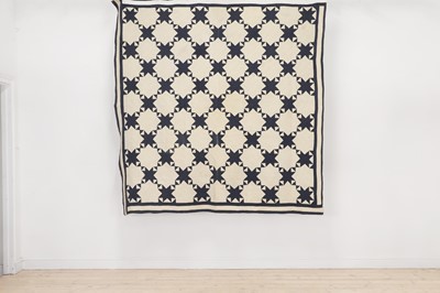 Lot 441 - A cotton patchwork quilt