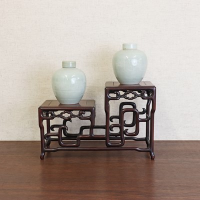 Lot 168 - A pair of Chinese celadon jars and covers