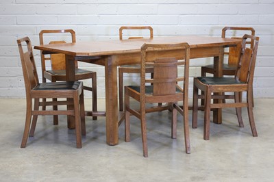 Lot 478 - An Art Deco pollard oak dining suite