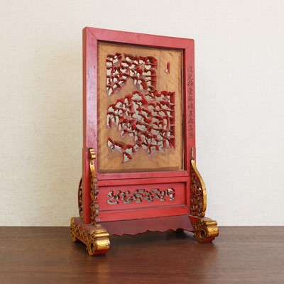 Lot 187 - A Chinese gilt lacquered wood table screen