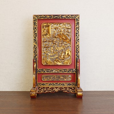 Lot 187 - A Chinese gilt lacquered wood table screen