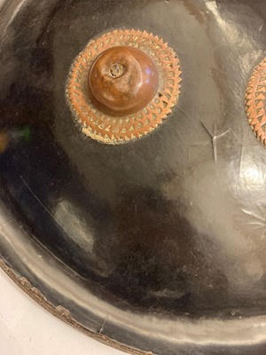 Lot 146 - A lacquered hide shield