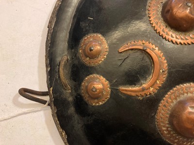 Lot 146 - A lacquered hide shield
