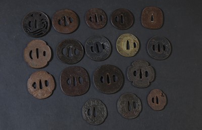 Lot 88 - A group of seventeen Japanese bronze tsuba