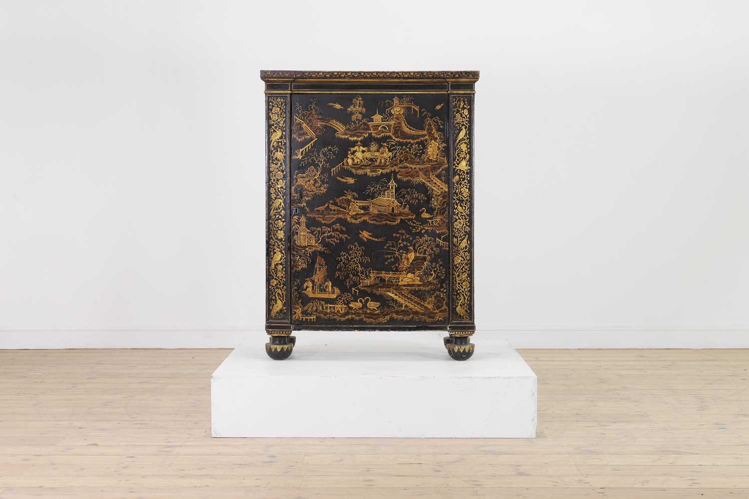 Lot 365 - A Regency black and gilt japanned side cabinet