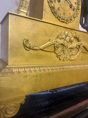 Lot 132 - An Empire ormolu mantel clock
