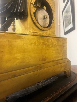 Lot 132 - An Empire ormolu mantel clock