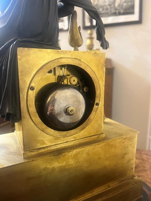 Lot 132 - An Empire ormolu mantel clock