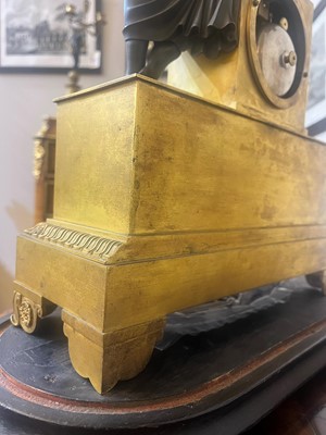Lot 132 - An Empire ormolu mantel clock