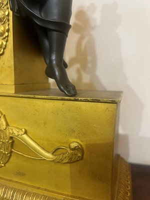 Lot 132 - An Empire ormolu mantel clock