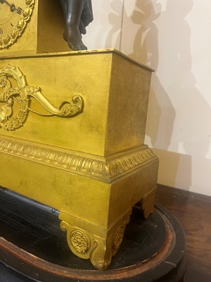 Lot 132 - An Empire ormolu mantel clock