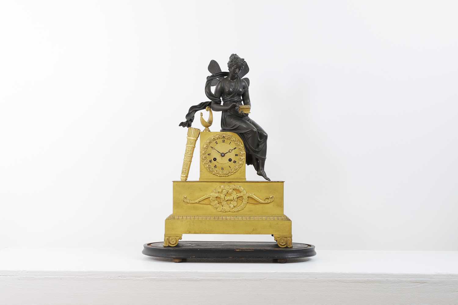 Lot 132 - An Empire ormolu mantel clock