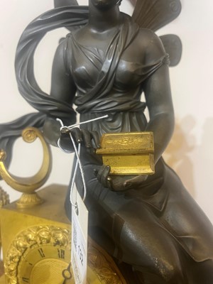 Lot 132 - An Empire ormolu mantel clock
