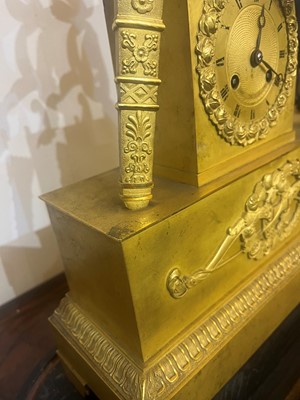 Lot 132 - An Empire ormolu mantel clock