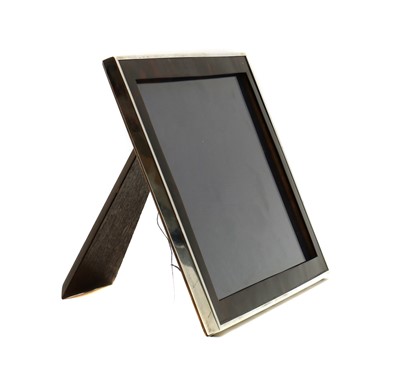 Lot 12 - A silver and faux tortoiseshell photograph frame