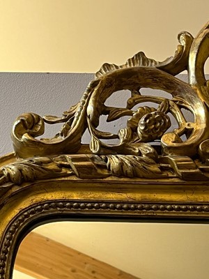Lot 137 - A Louis XVI-style giltwood and gesso wall mirror