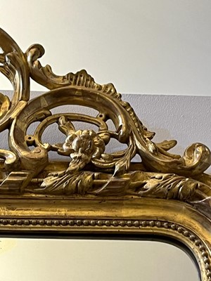 Lot 137 - A Louis XVI-style giltwood and gesso wall mirror
