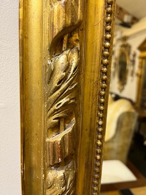 Lot 137 - A Louis XVI-style giltwood and gesso wall mirror