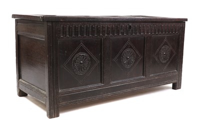 Lot 328 - An oak coffer