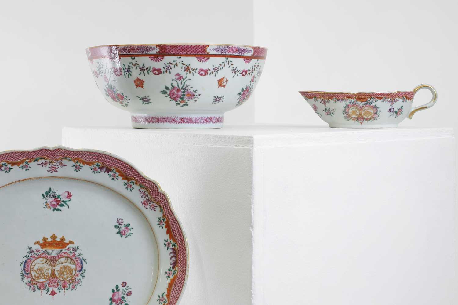 Lot 69 - An export armorial porcelain part dinner service