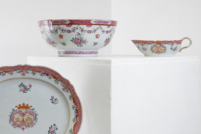 Lot 69 - An export armorial porcelain part dinner service
