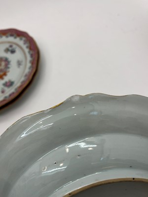 Lot 69 - An export armorial porcelain part dinner service