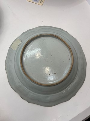 Lot 69 - An export armorial porcelain part dinner service