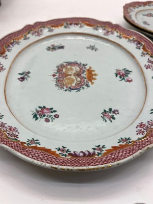 Lot 69 - An export armorial porcelain part dinner service