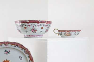 Lot 69 - An export armorial porcelain part dinner service