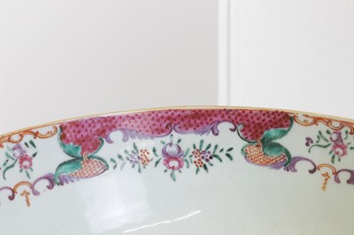 Lot 69 - An export armorial porcelain part dinner service